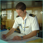 small photograph of MNTB officer on Navigation deck